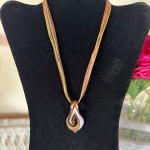 Tear drop Copper, Brown and White 
Pendant Necklace Brown and Green 
Ribbon.